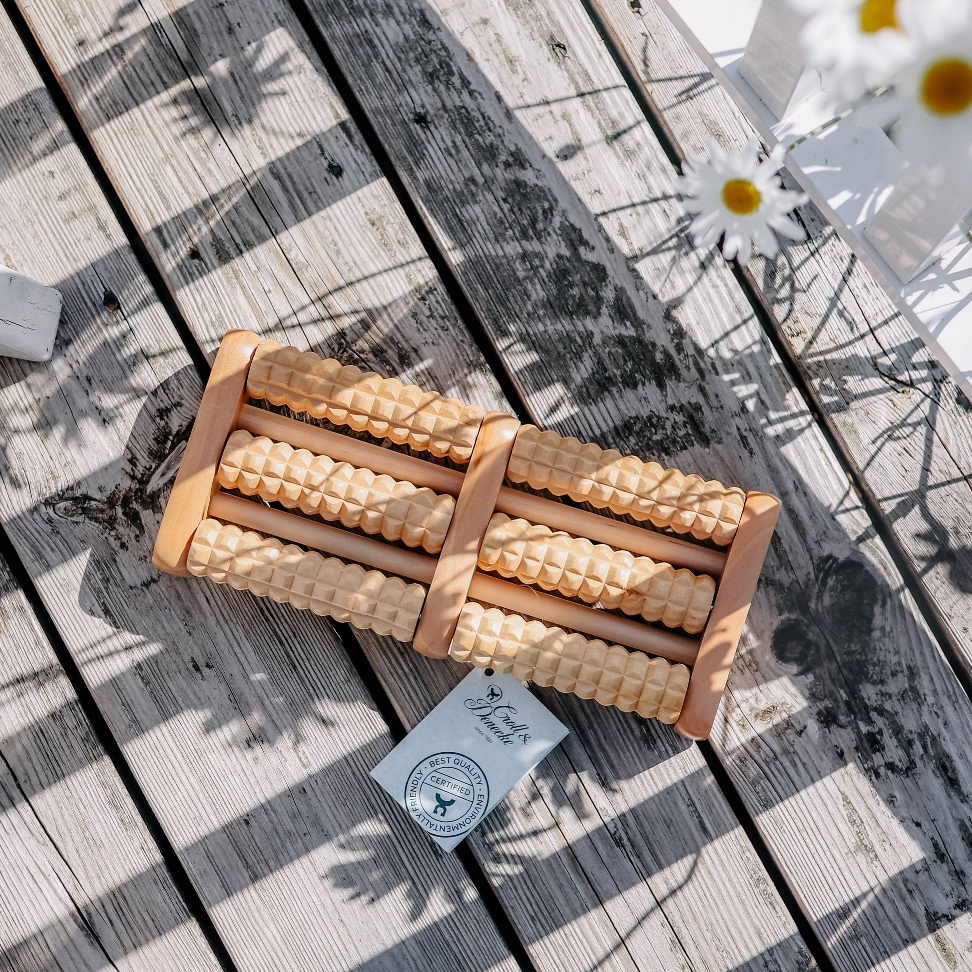 Fußreflexzonen-Massageroller aus Lotusholz mit rotierenden Rollen – aktiviert Energiefluss und löst Verspannungen im ganzen Körper.